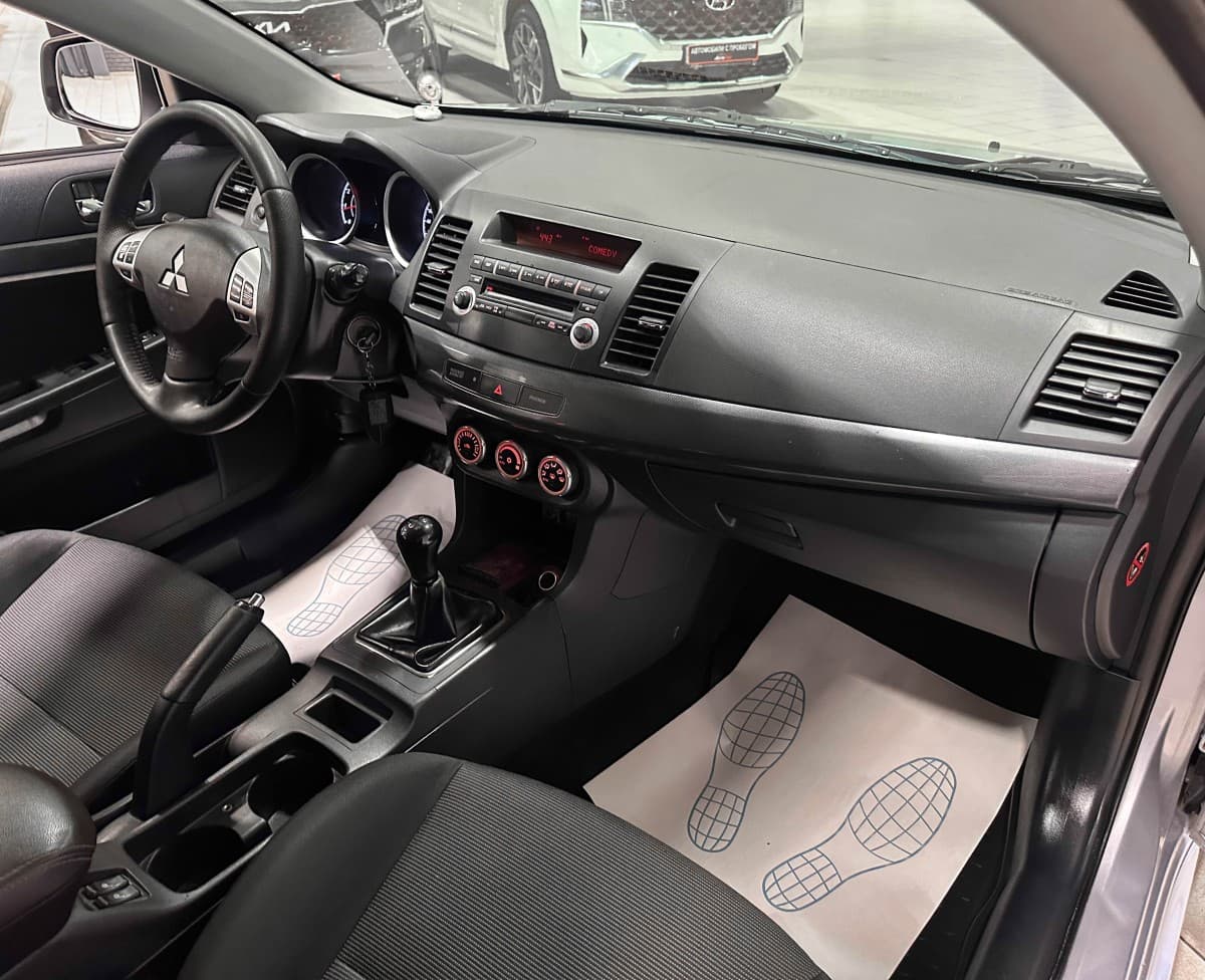 Mitsubishi Lancer - фото 16